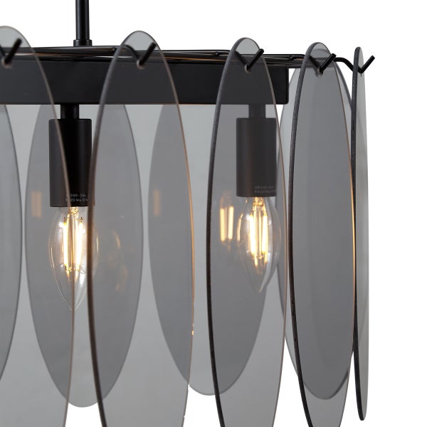 Moderne Pendelleuchte mit runden, transparenten Schirmen und Glühbirnen