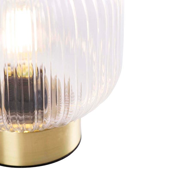 Tischleuchte aus geriffeltem Glas mit goldenem Sockel