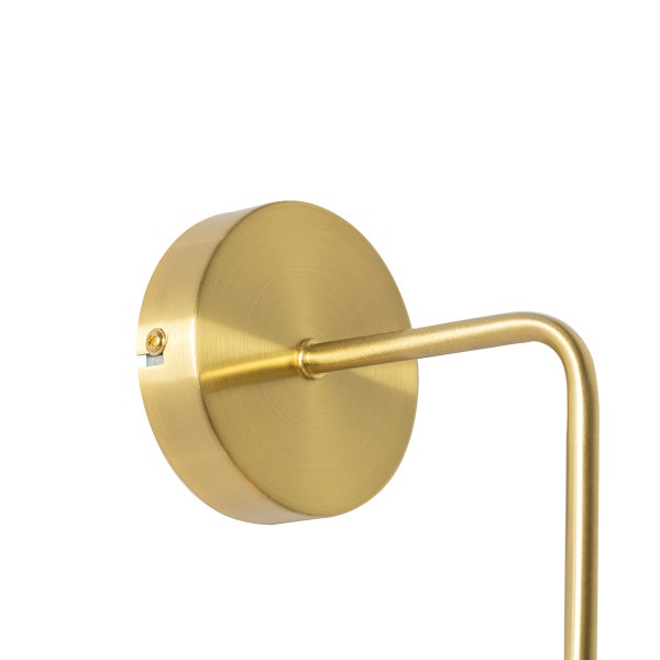 Detail einer Wandleuchte mit runder Halterung und Arm