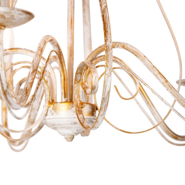 Detailansicht einer Deckenleuchte mit geschwungenen, dekorativen Elementen