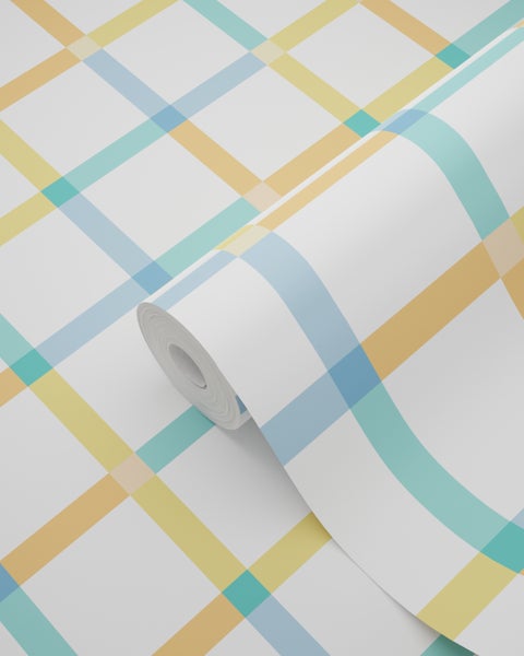 Tapetenrolle mit großem Karomuster in Blau, Gelb und Grün auf weißem Hintergrund.