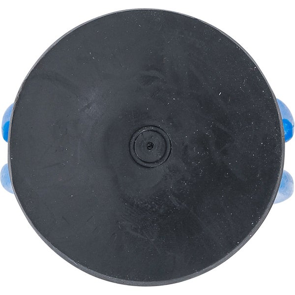 Ansicht von oben eines Möbelrollers mit einer runden, schwarzen Oberfläche und blauen Rollen