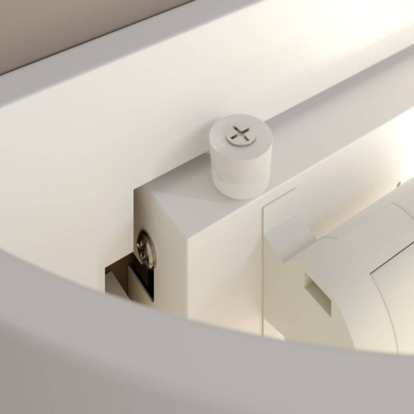 Nahaufnahme einer Möbelmontage mit einer Kreuzschlitzschraube und einem weißen Kunststoffteil.