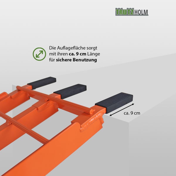 Trutzholm Logo. Detailansicht einer orangefarbenen Auffahrrampe mit einer Auflagefläche von circa 9 cm für sichere Benutzung.