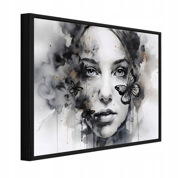 Wandbild mit abstraktem Frauenporträt und Schmetterlingen in einem schwarzen Rahmen.