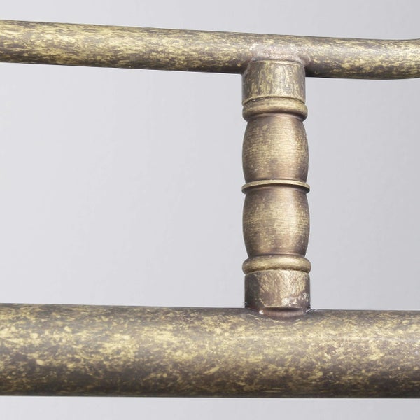 Detailaufnahme eines goldenen Metallrahmens