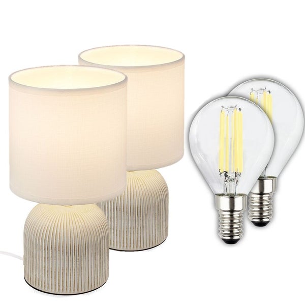 Zweiteiliges Tischleuchten-Set mit geriffelten Keramikfüßen und Stoffschirmen inklusive zwei LED-Leuchtmitteln.