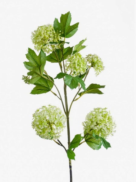 Künstliches Dekogras-Set bestehend aus drei Pflanzen in verschiedenen Höhen in schwarzen Kunststofftöpfen.