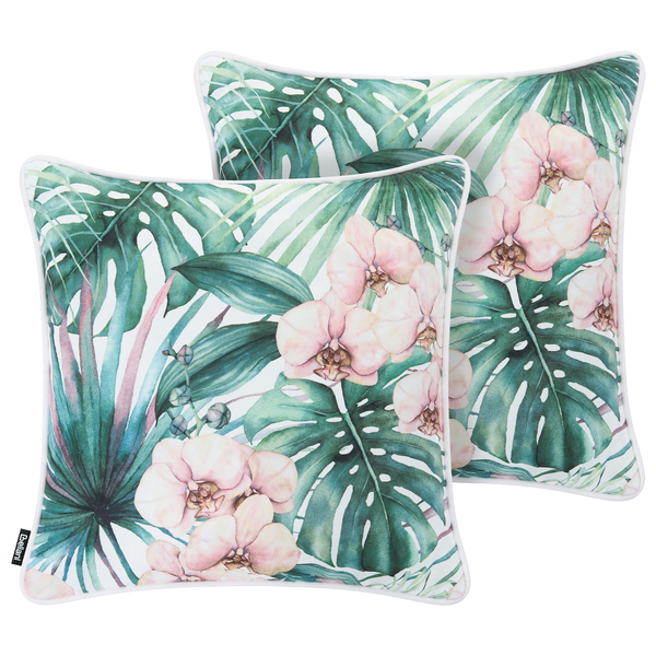 Zwei quadratische Dekokissen mit tropischem Muster aus Orchideen und Monstera Blättern