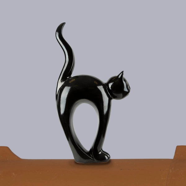 Schwarze Firstfigur Katze aus Keramik, glänzende Oberfläche, für die Dachdekoration.