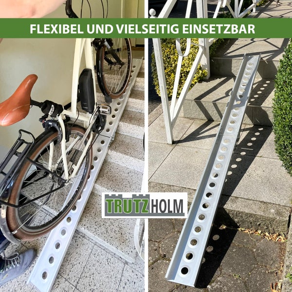 Fahrrad auf einer Treppe mit einer Fahrradrampe von Trutzholm