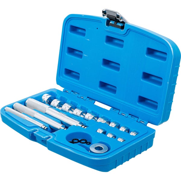 Werkzeugsatz mit Dornen und Adaptern in geöffnetem blauen Koffer