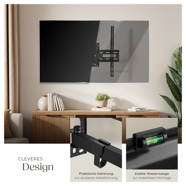 Wohnzimmer mit montiertem Fernseher an einer schwarzen TV-Wandhalterung mit integrierter Wasserwaage und Kabelmanagement.