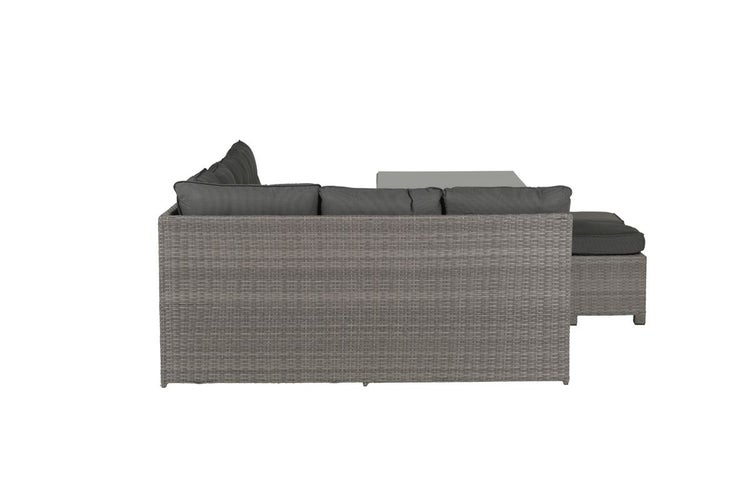 Garten-Lounge-Set aus grauem Polyrattan mit dunkelgrauen Polstern und Tisch in der Rückansicht.