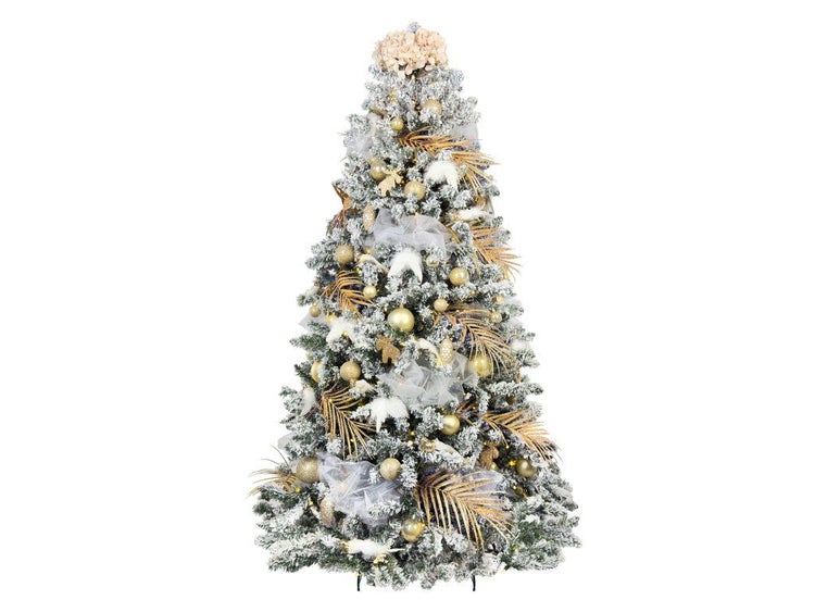 Künstlicher Weihnachtsbaum mit Schneeoptik, geschmückt mit Kugeln, Girlanden und künstlichen Palmwedeln, ideal als festliche Weihnachtsdekoration.