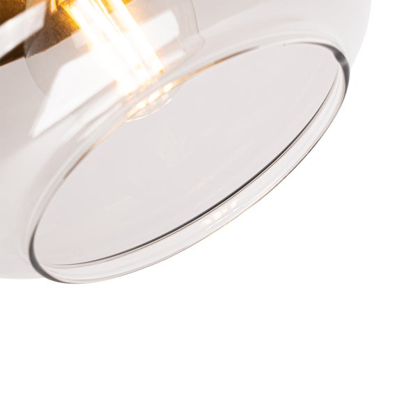 Nahaufnahme einer transparenten Glaslampe mit Glühbirne