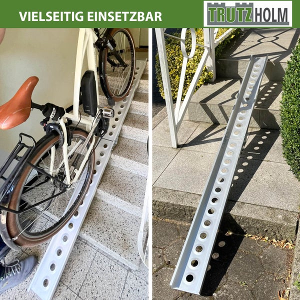 Fahrrad auf Treppe mit Trutzholm Logo