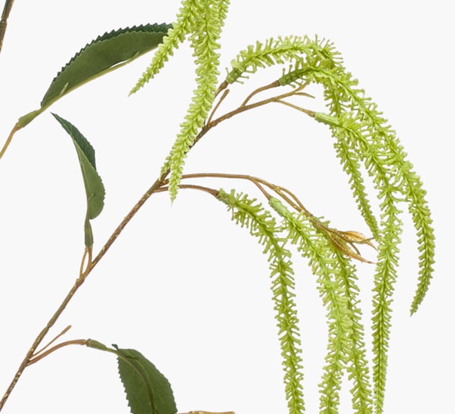 Künstlicher Zweig mit grünen hängenden Blüten und grünen Blättern an einem braunen Stiel.