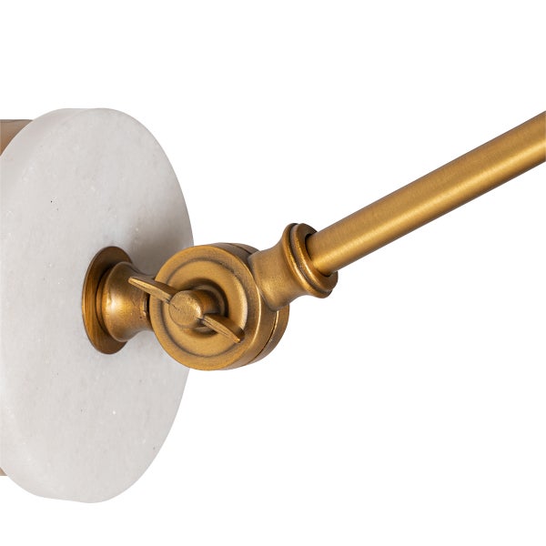 Detailaufnahme einer Wandleuchte aus Marmor und Metall