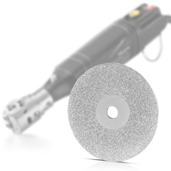 Diamanttrennscheibe mit Schleifwerkzeug im Hintergrund