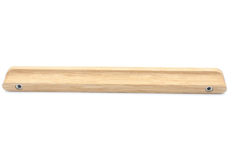 Holzleiste mit Bohrlöchern