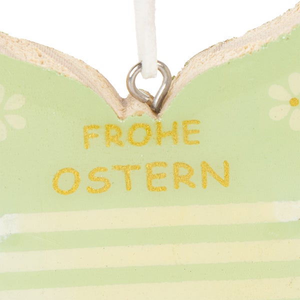 Dekorativer Osteranhänger mit der Aufschrift 'Frohe Ostern'.