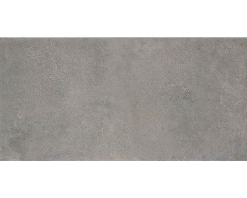 Graue Bodenfliese mit matter Oberfläche.