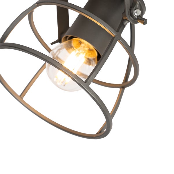 Industrielle Gitterlampe mit leuchtendem Leuchtmittel in Metallkäfig