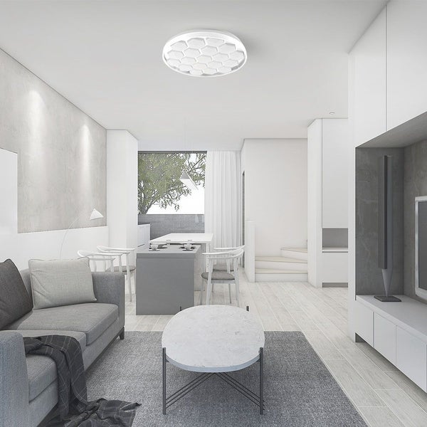 Modernes Wohnzimmer mit Deckenleuchte, Sofa und Esstisch