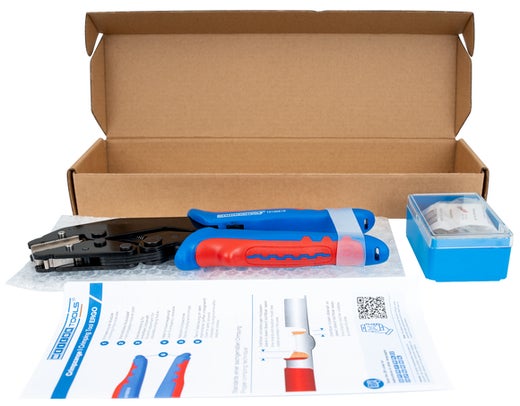 Crimpzange mit Kabelschuhen und Bedienungsanleitung in Pappkarton