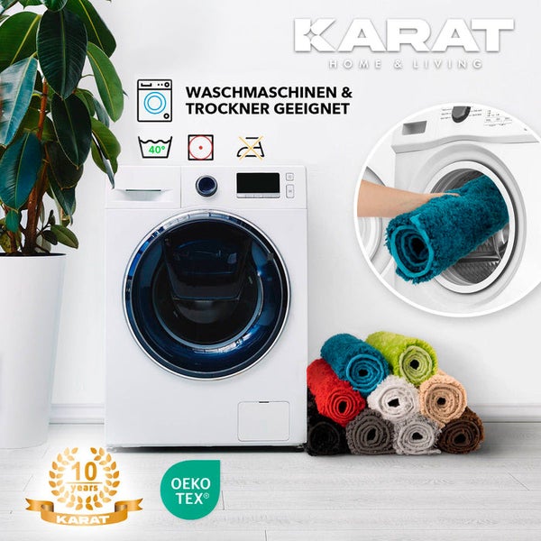 Waschmaschinengeeignete Badematten neben Waschmaschine mit Karat Logo, 10 Jahre Garantie und OEKO-TEX Siegel