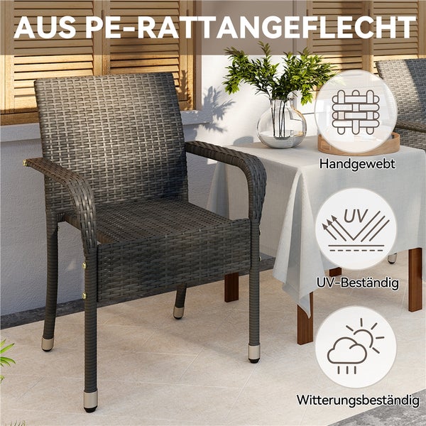 Gartenstuhl aus handgewebtem Polyethylen-Rattangeflecht auf einer Terrasse neben einem Tisch. Ultraviolettbeständig und witterungsbeständig.
