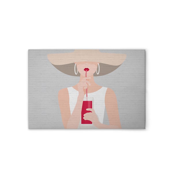 Dekorative Leinwand mit einer Frau, die einen Drink genießt, vor einer Mauer.