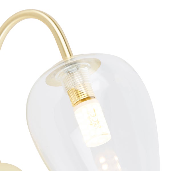 Detailaufnahme einer Lampe mit klarem Glasschirm und Leuchtmittel