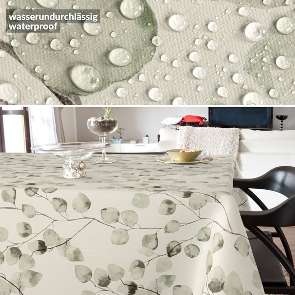 Tisch mit wasserundurchlässiger Tischdecke mit Blätterdruck