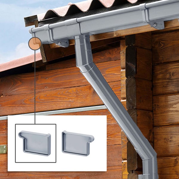 Rinnenendstücke für eine Dachrinne montiert an einem Gartenhaus aus Holz.