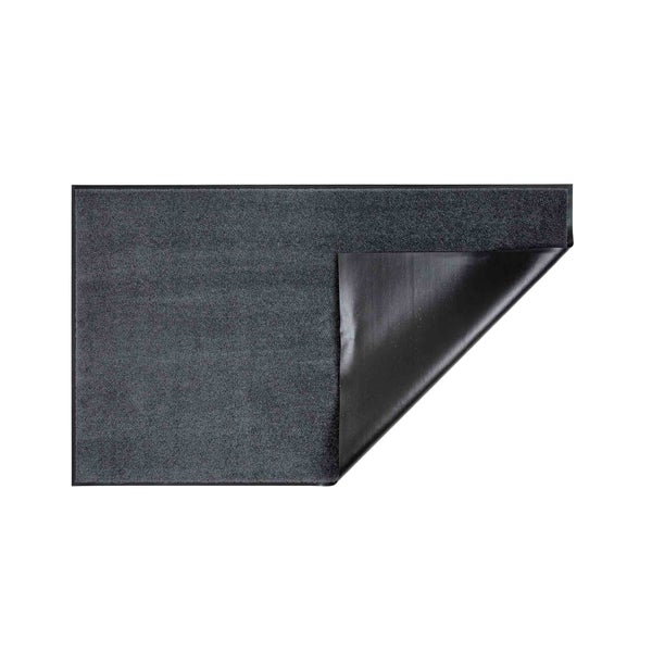 Fußmatte mit geknickter Ecke zur Darstellung der Rückseite