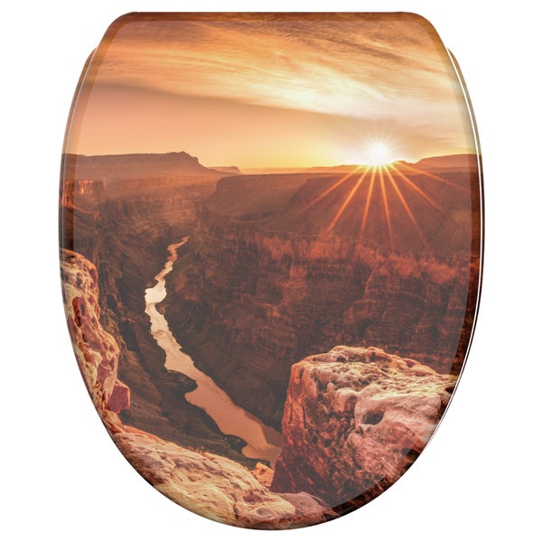 WC-Sitz mit glänzender Oberfläche und Motivdruck Grand Canyon bei Sonnenuntergang mit Fluss.