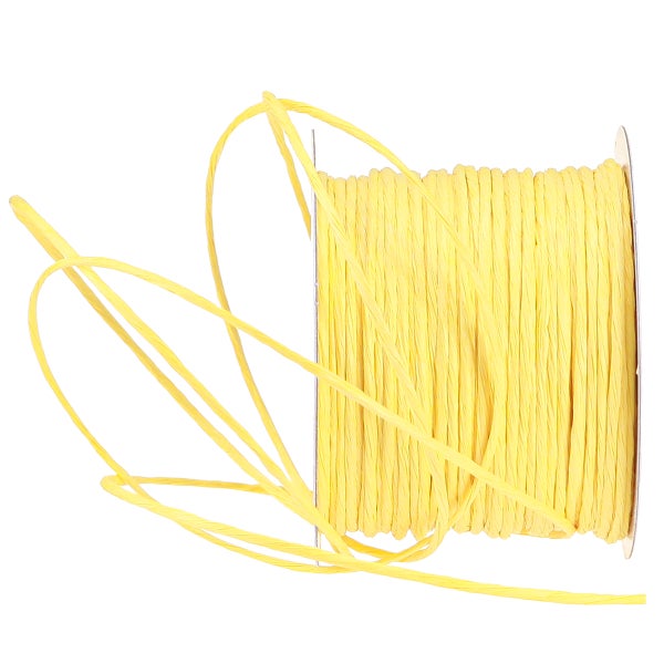 Gelbe Papierkordel auf einer Spule zum Basteln und Dekorieren