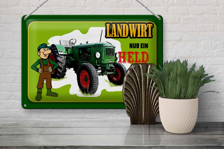 Femer Logo. Metallschild mit Motiv Landwirt, Traktor und Spruch