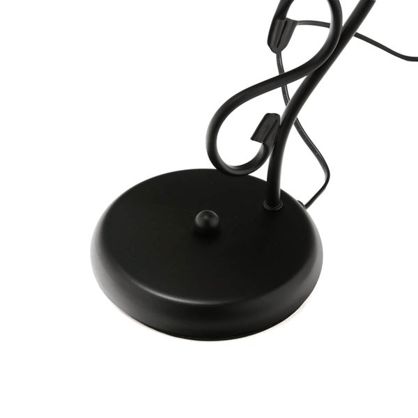 Detailaufnahme des Sockels einer Tischleuchte aus Metall