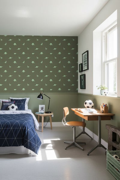 Jungenzimmer mit Bett, Schreibtisch und Dinosaurier-Tapete