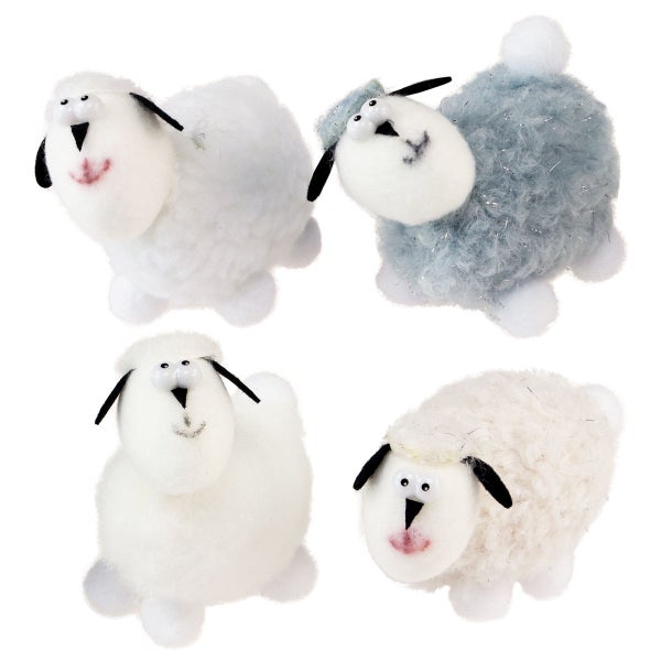 Vier dekorative Schafe aus Plüsch