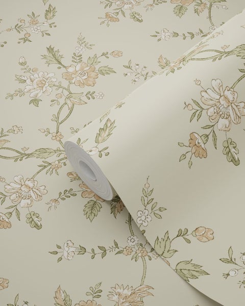 Vliestapete mit floralem Vintage-Muster, zarte Blumen und Blattranken auf einer Rolle.
