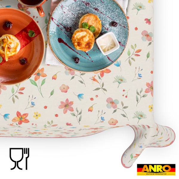 Abwaschbare Tischdecke mit Blumenmuster, lebensmittelecht. ANRO Logo und Symbol für Eignung zum Kontakt mit Lebensmitteln.