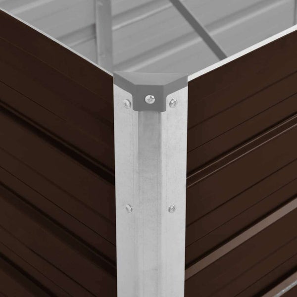 Eckverbindung eines Metall-Hochbeets mit verzinktem Eckprofil und Schutzkappe aus Kunststoff.