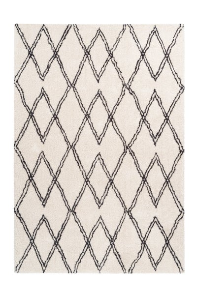 Hochflor-Teppich mit Rautenmuster, cremefarben und schwarz.
