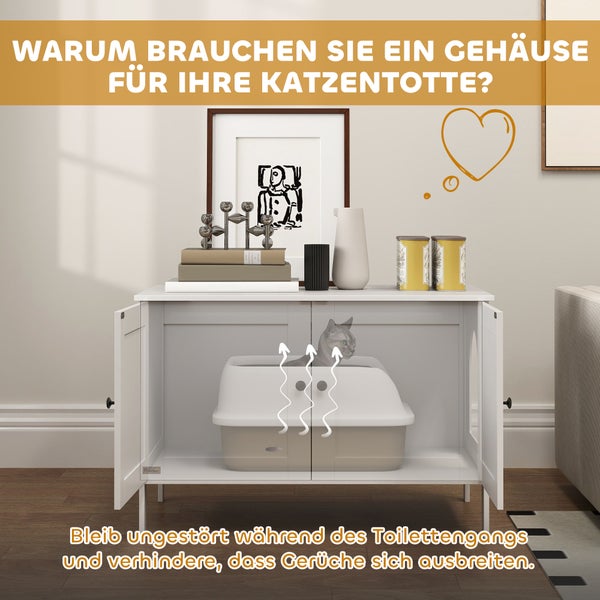 Weißer Katzentoilettenschrank aus Holz mit Katze im Inneren, geöffneten Türen und Dekoration auf der Oberfläche in einem hellen Wohnraum.