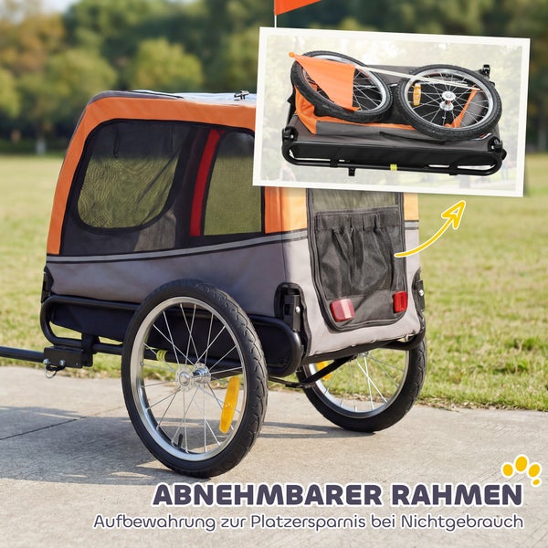 Zusammenklappbarer Hundeanhänger für das Fahrrad in Grau und Orange, zeigt den aufgebauten Zustand und die platzsparende Faltfunktion im Detail.