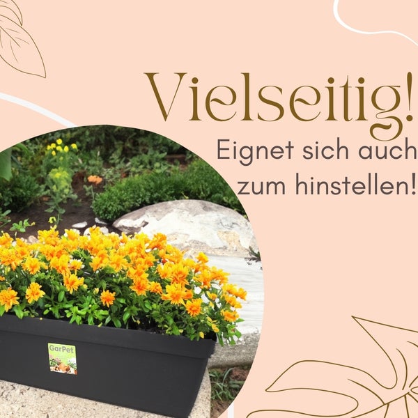 Schwarzer Blumenkasten mit gelben Blumen, geeignet zum Aufstellen.